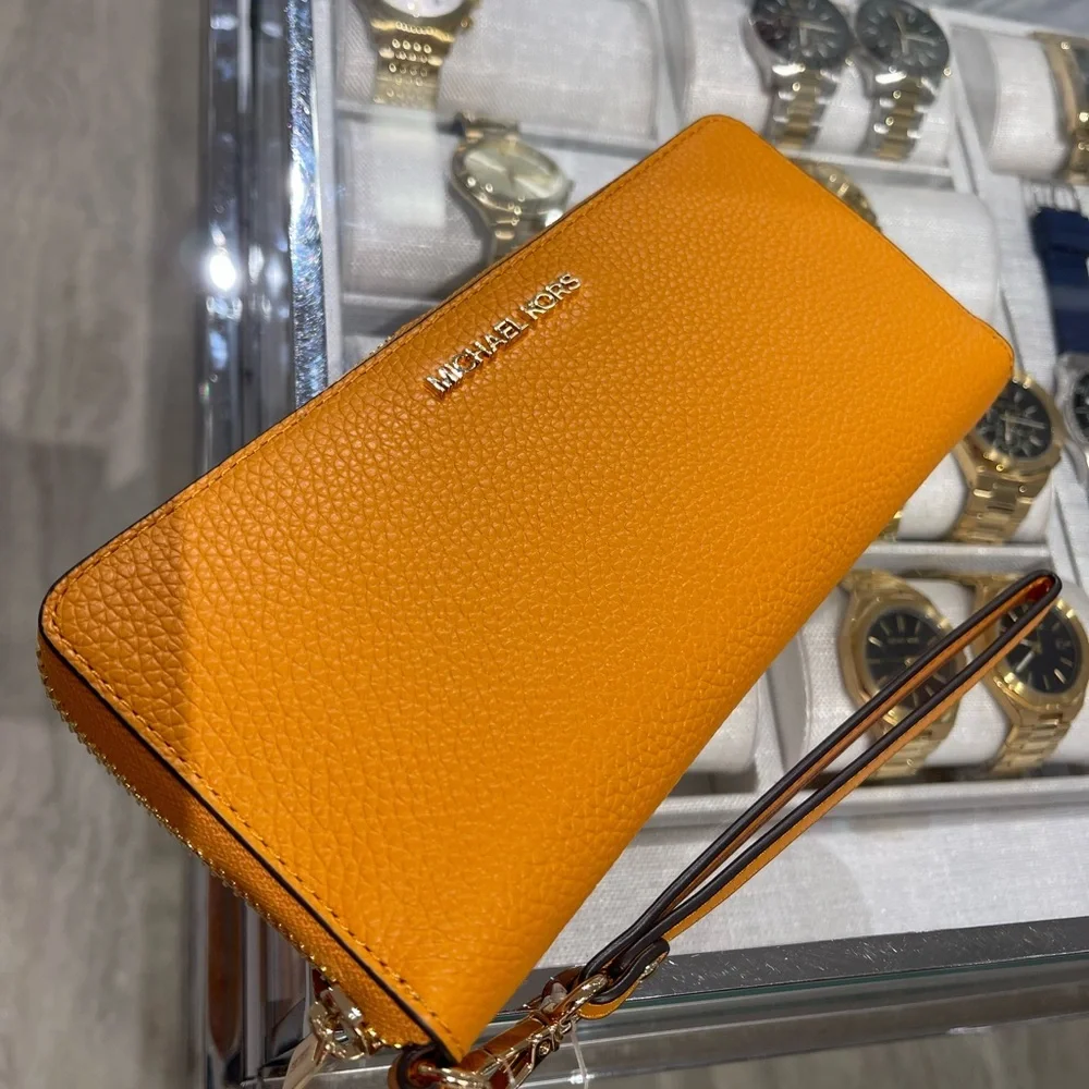 MICHAEL KORS Jet Set Travel Lg Pebbled Leather Continental Wristlet
Rad Orange - Picture 9 of 16